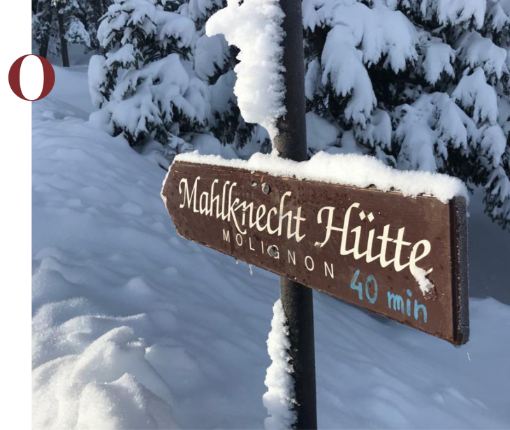 Rifugio Molignon Alpe di Siusi | Scoprite la magia dell'inverno: Alpe di Siusi, Molignon, Slong e Plattkofel in Alto Adige L'immagine mostra il cartello innevato per Mahlknechthütte.